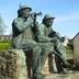 Monument aux Sonneurs de biniou. Les binious ou les sonneurs